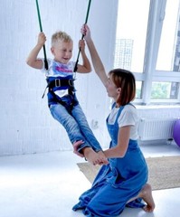 Inclusive Movement bungee straps for kids with CP. Soft bungees for kids